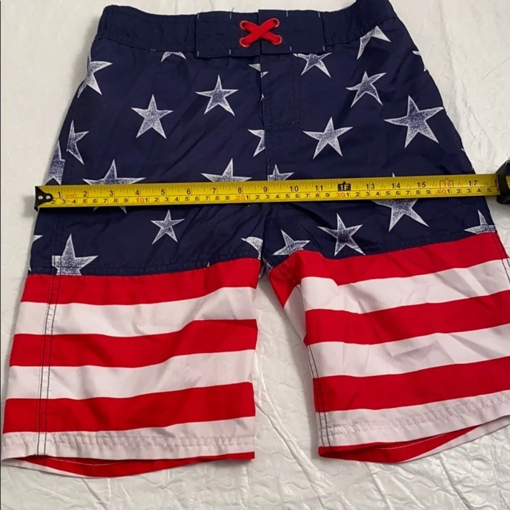 Cat and Jack American Flag red white blue swim trunks L = 12-14
